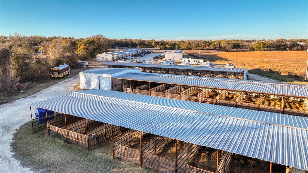 120 Bunkhouse Road Stephenville, TX 76401 - Photo 10 of 40 a view of a balcony with wooden floor and city view