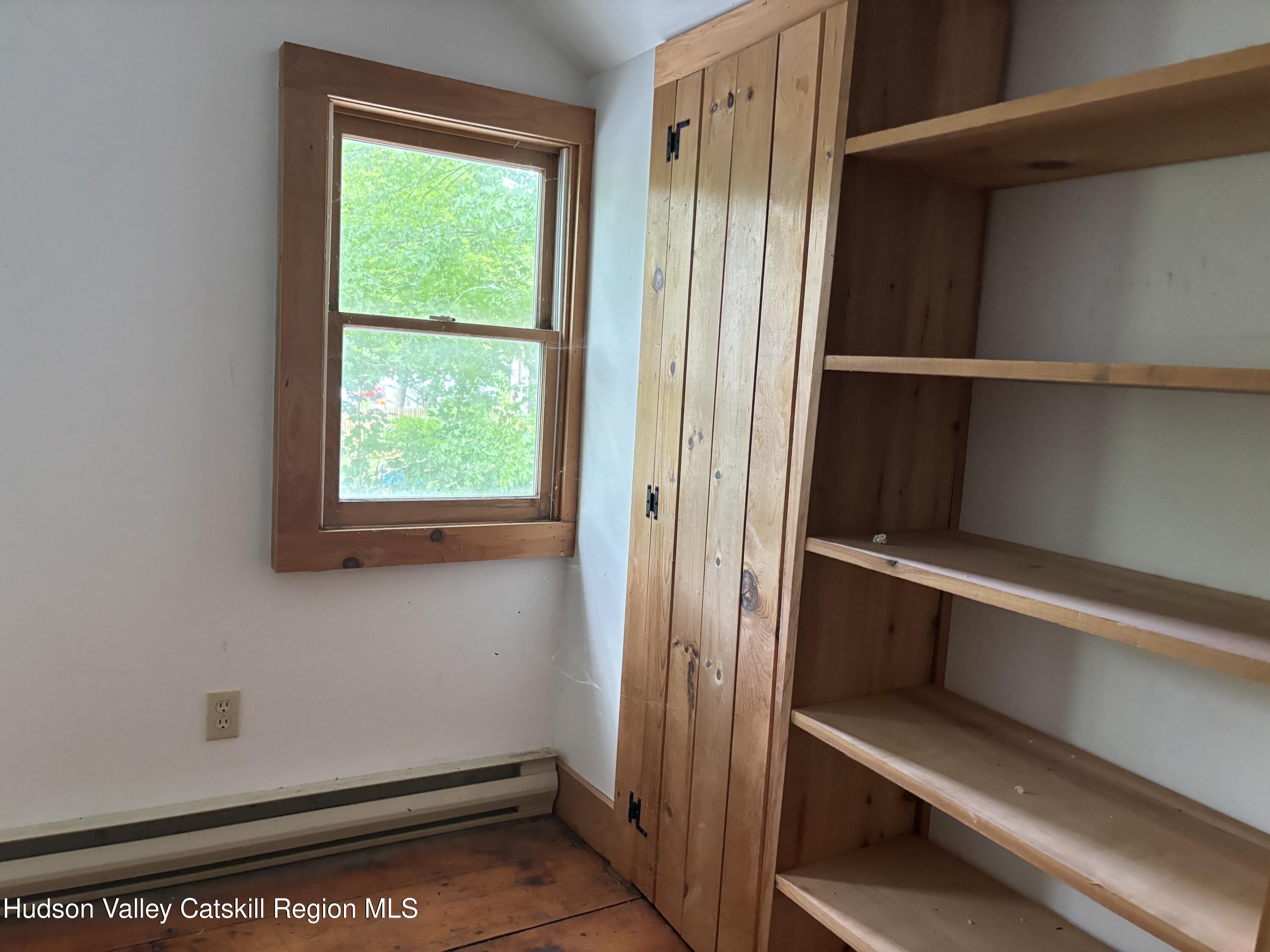 524 Shaker Museum Road Chatham, NY 12136 - Photo 8 of 12 524 Shaker Museum bookcase