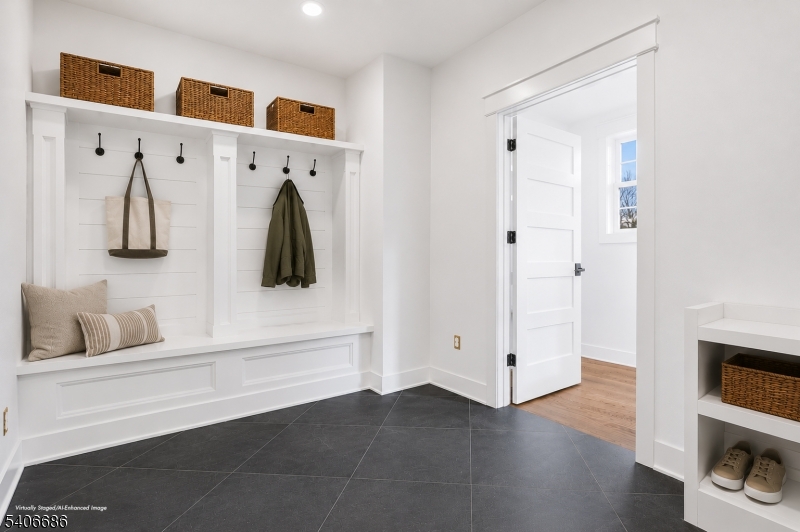 759 Mechlin Corner Road Hampton, NJ 08827 - Photo 21 of 45 a bathroom with a walk in closet and mirror