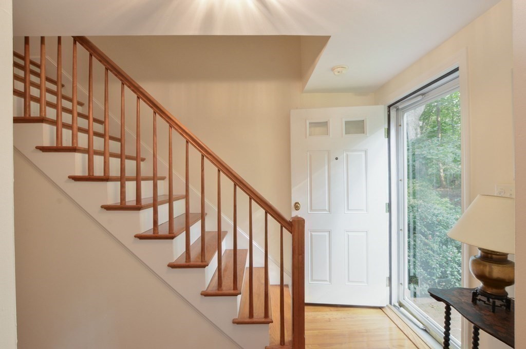 57 Two Ponds Road Falmouth, MA 02540 - Photo 24 of 42 a view of entryway with wooden floor and stairs