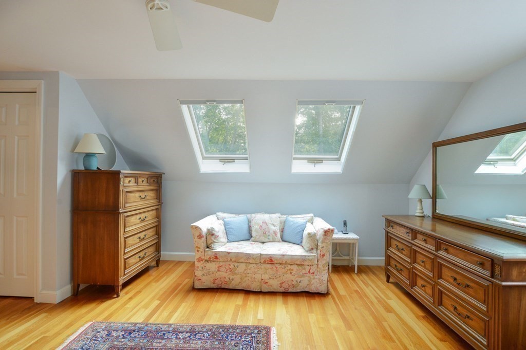 57 Two Ponds Road Falmouth, MA 02540 - Photo 27 of 42 a living room with furniture and a flat screen tv