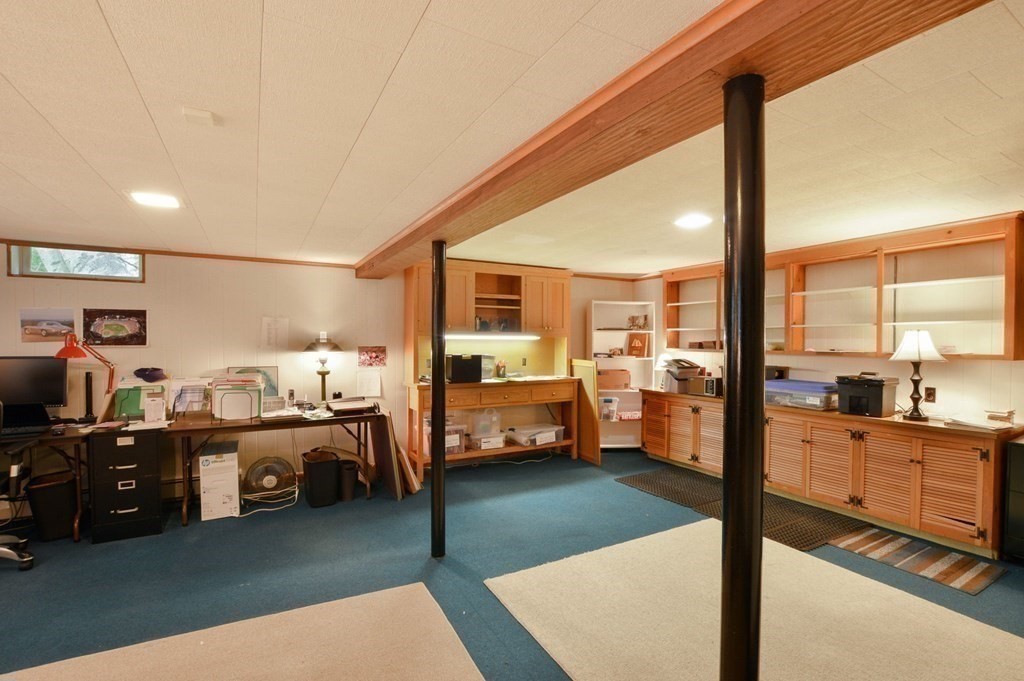 57 Two Ponds Road Falmouth, MA 02540 - Photo 33 of 42 a bedroom with furniture and a large window
