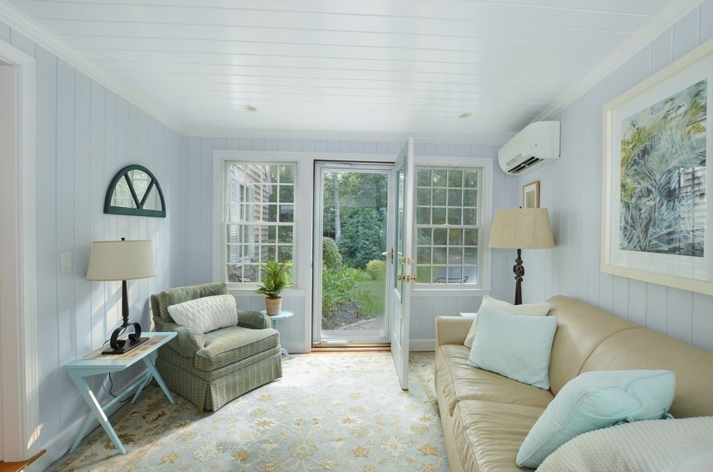 57 Two Ponds Road Falmouth, MA 02540 - Photo 5 of 42 a living room with furniture and a window