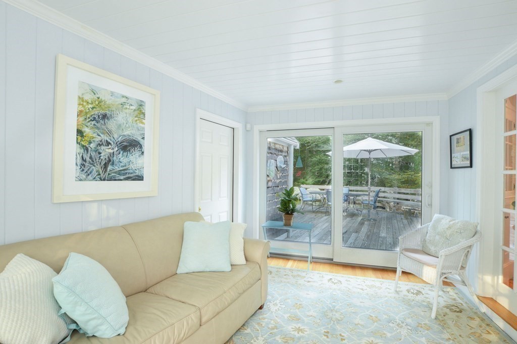 57 Two Ponds Road Falmouth, MA 02540 - Photo 6 of 42 a living room with furniture and a large window