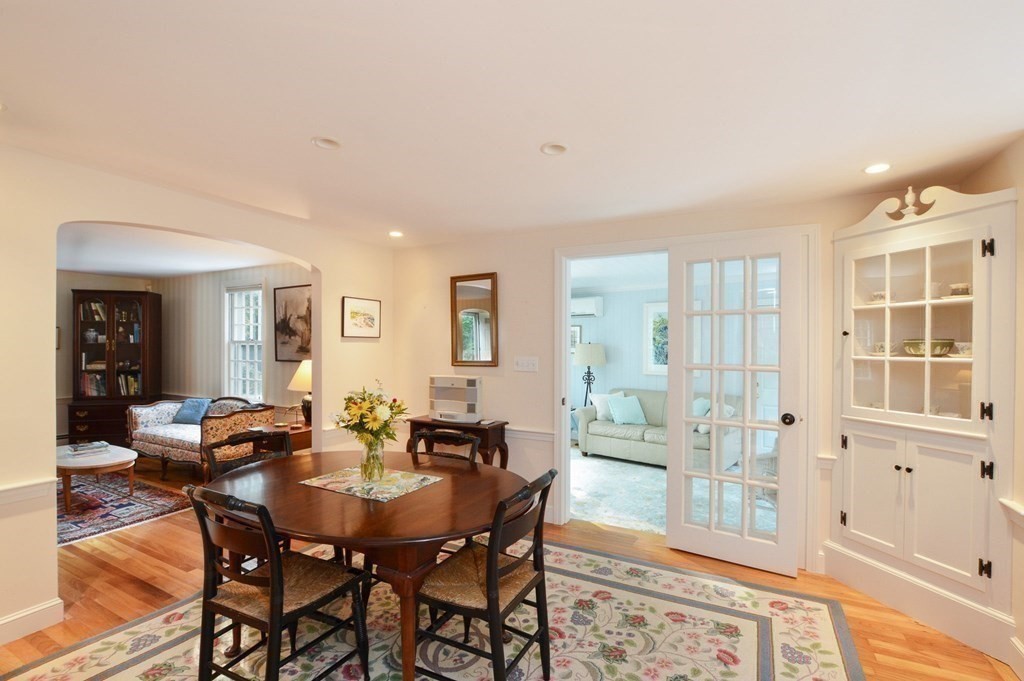 57 Two Ponds Road Falmouth, MA 02540 - Photo 7 of 42 a view of a dining room with furniture and wooden floor