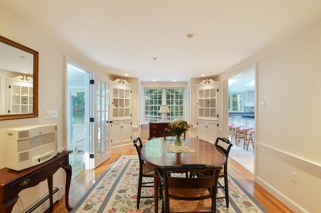 57 Two Ponds Road Falmouth, MA 02540 - Photo 8 of 42 a view of a dining room with furniture window and outside view