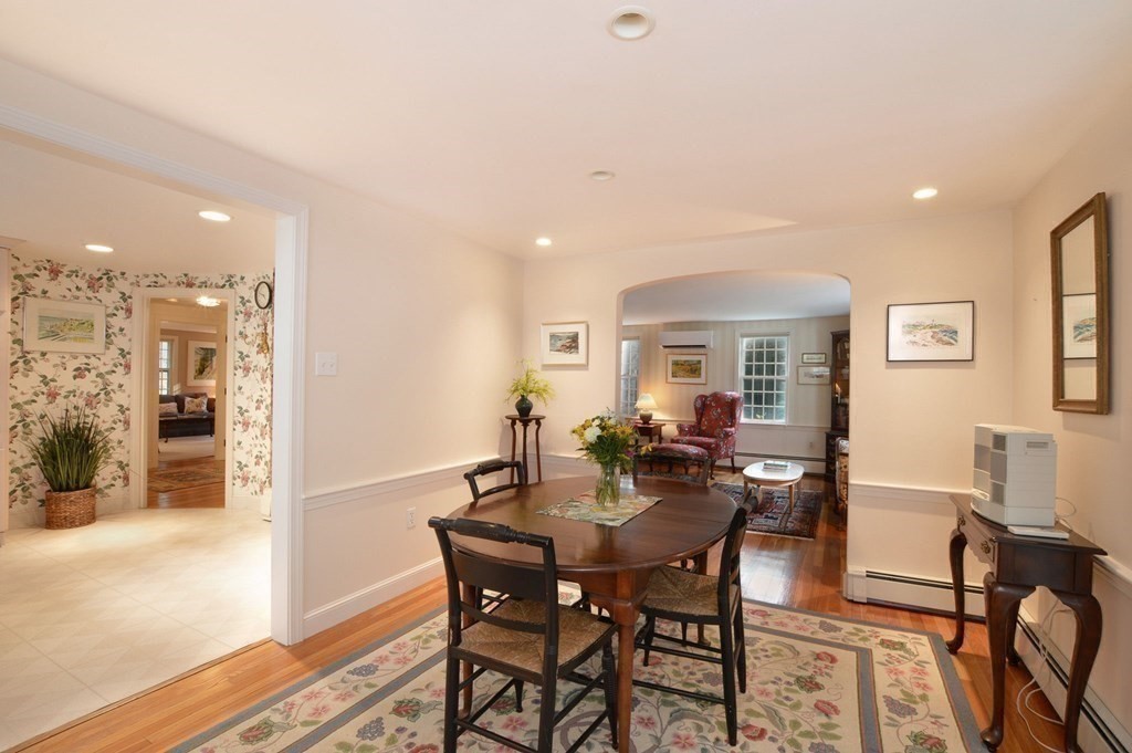 57 Two Ponds Road Falmouth, MA 02540 - Photo 9 of 42 a view of a dining room with furniture