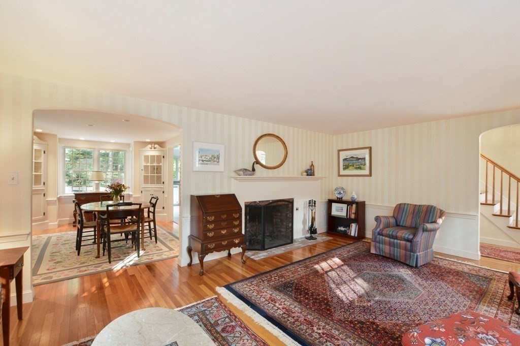 57 Two Ponds Road Falmouth, MA 02540 - Photo 10 of 42 a living room with furniture and a fireplace