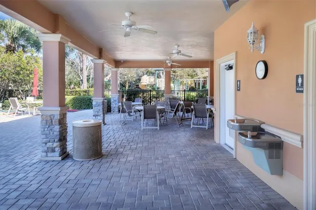 a view of outdoor space swimming pool and furniture
