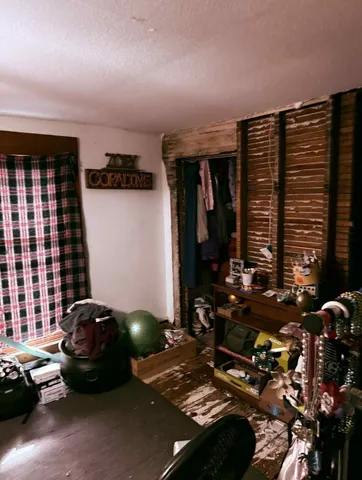 a view of a garage with cars