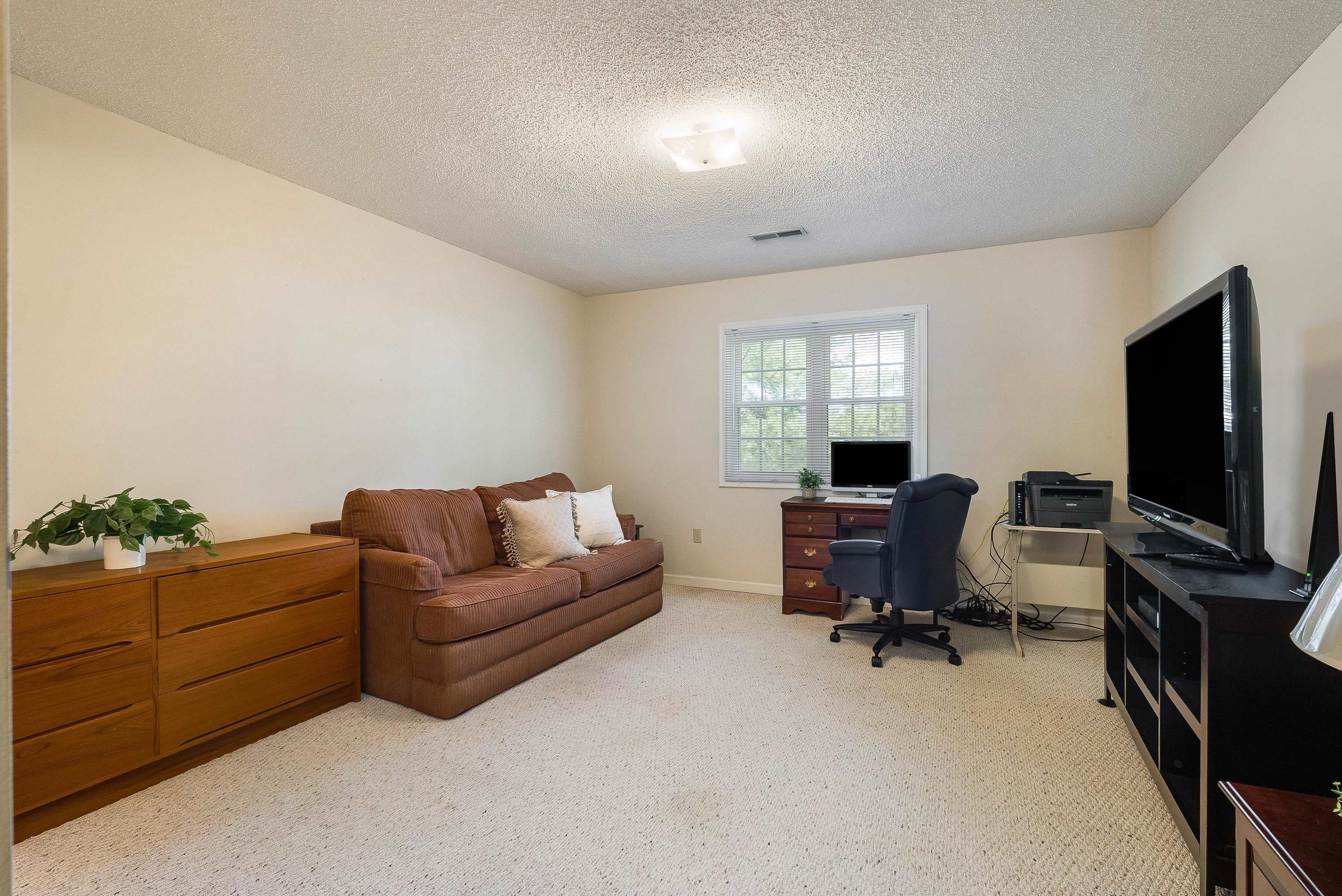 2015 Hampton Drive Waynesboro, VA 22980 - Photo 20 of 31 a living room with furniture and a flat screen tv