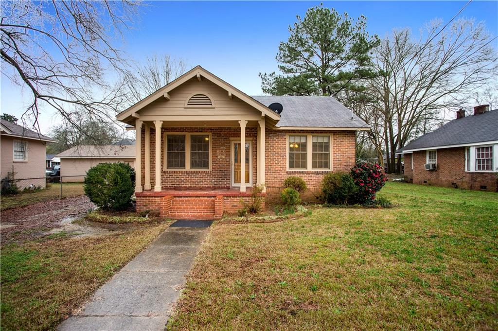 15 Beech Street Northeast Rome, GA 30161 - Photo 1 of 1 a view of a house with a yard