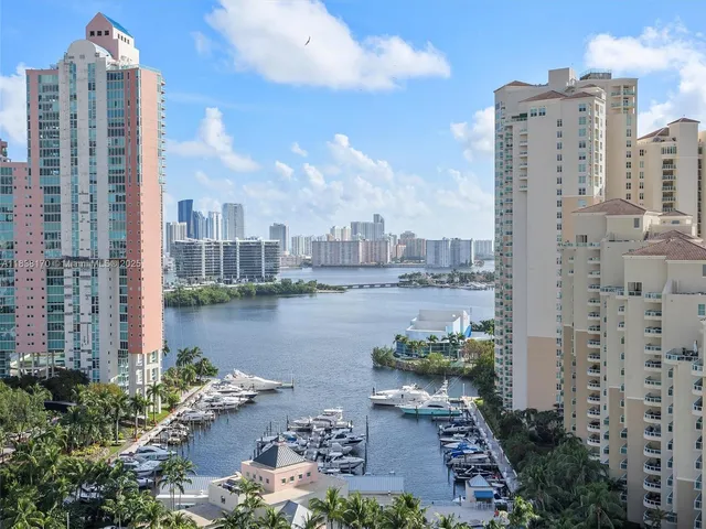 a view of a city with tall buildings