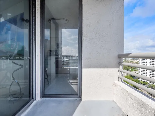 a view of a bathroom with a glass door