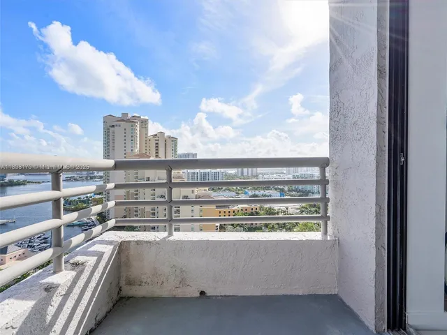 a view of kitchen with furniture and city view