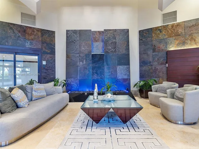 a view of a swimming pool with chairs