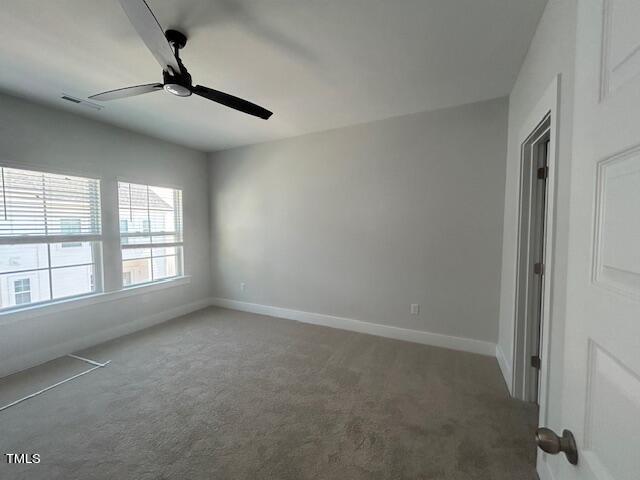 8524 Silsbee Drive Raleigh, NC 27613 - Photo 11 of 15 a view of an empty room with a window