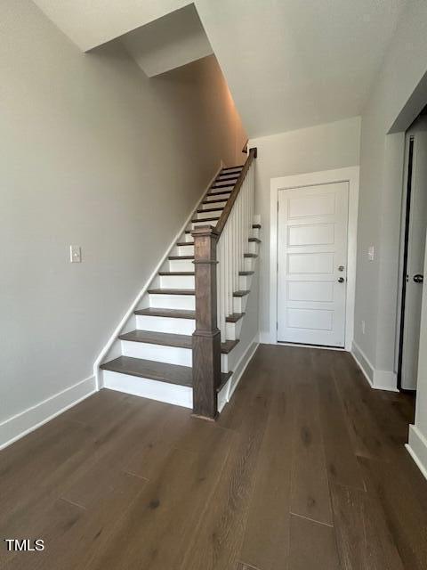 8524 Silsbee Drive Raleigh, NC 27613 - Photo 13 of 15 an empty room with wooden floor and windows