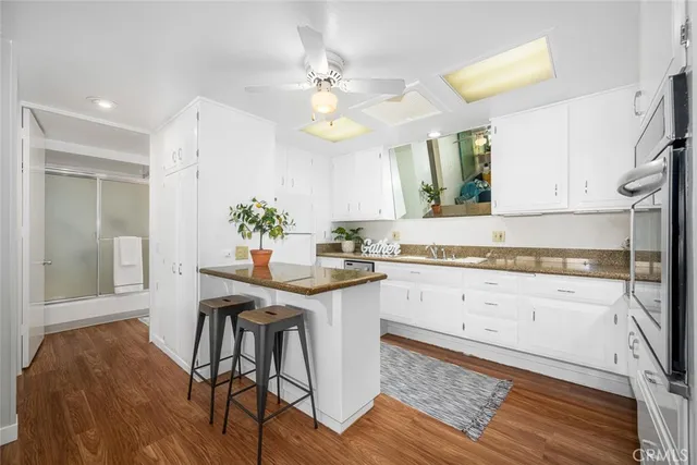 a kitchen with a table and chairs in it
