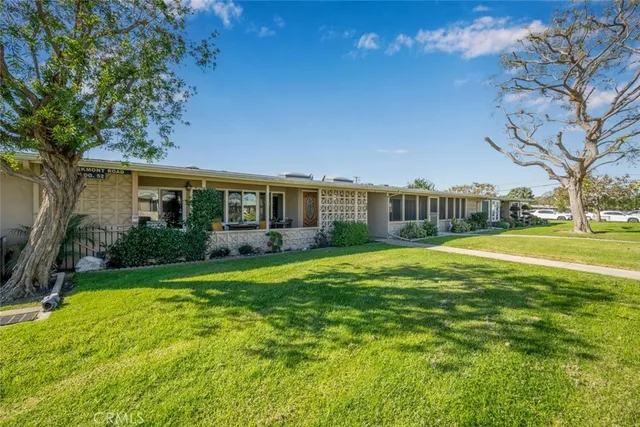 a view of a house with a big yard