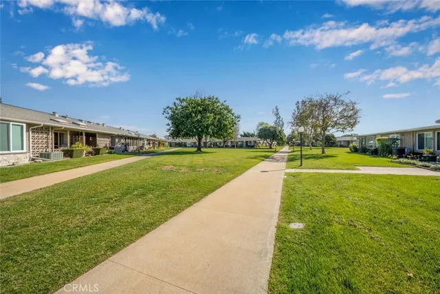 a view of a house with a big yard