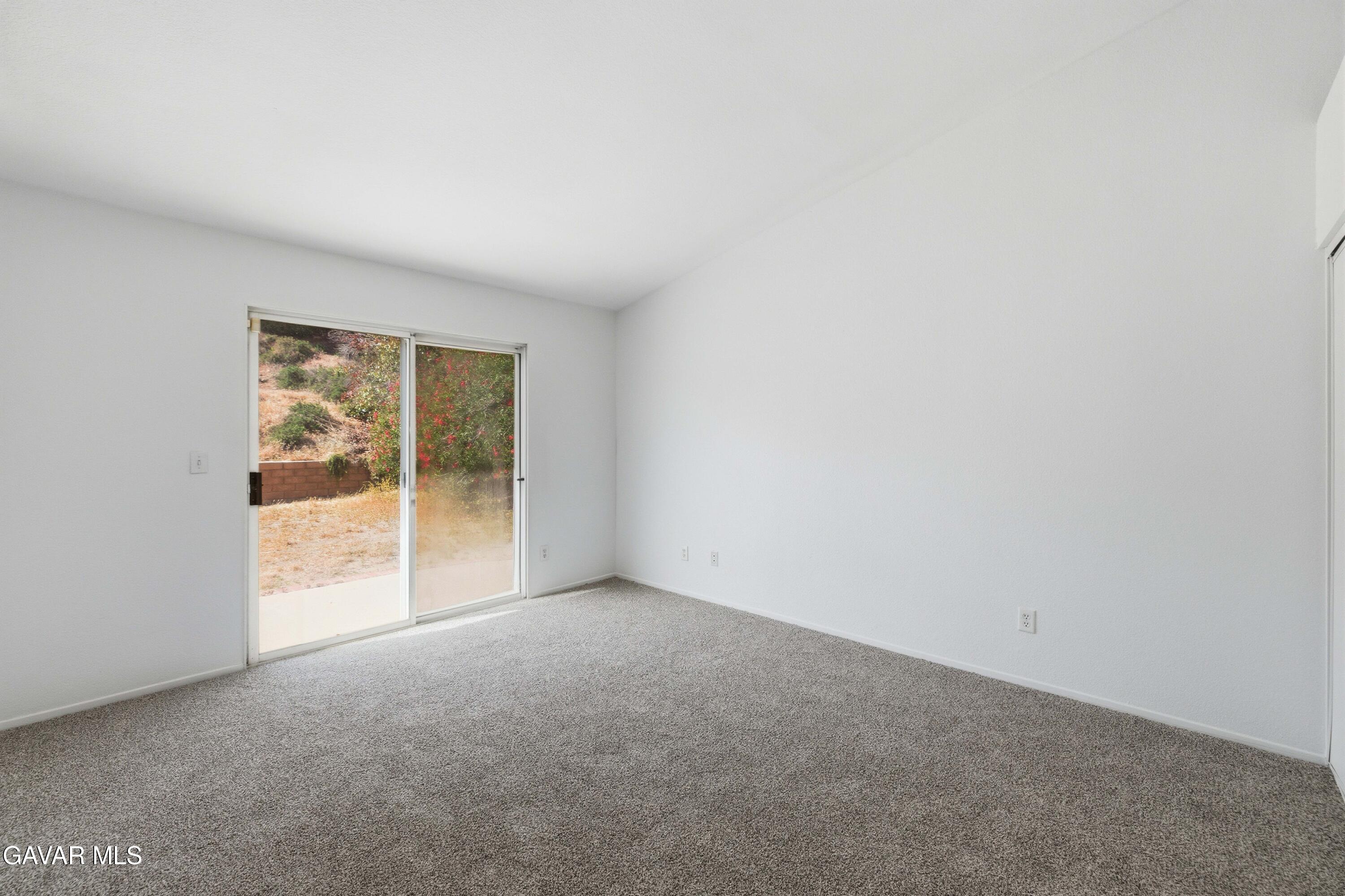 3254 Quarry Road Palmdale, CA 93550 - Photo 17 of 30 a view of an empty room with a window