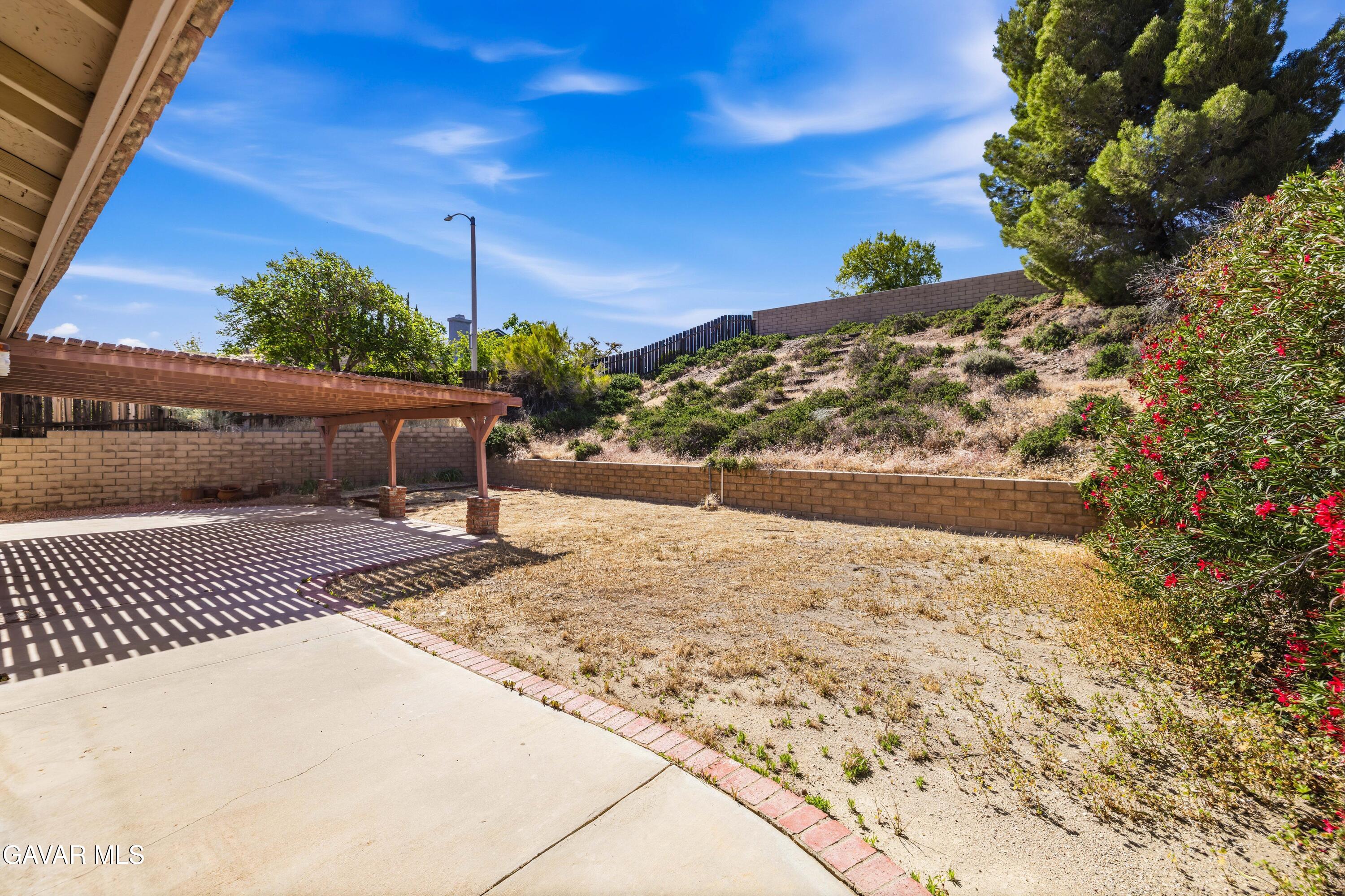 3254 Quarry Road Palmdale, CA 93550 - Photo 28 of 30 a view of a backyard