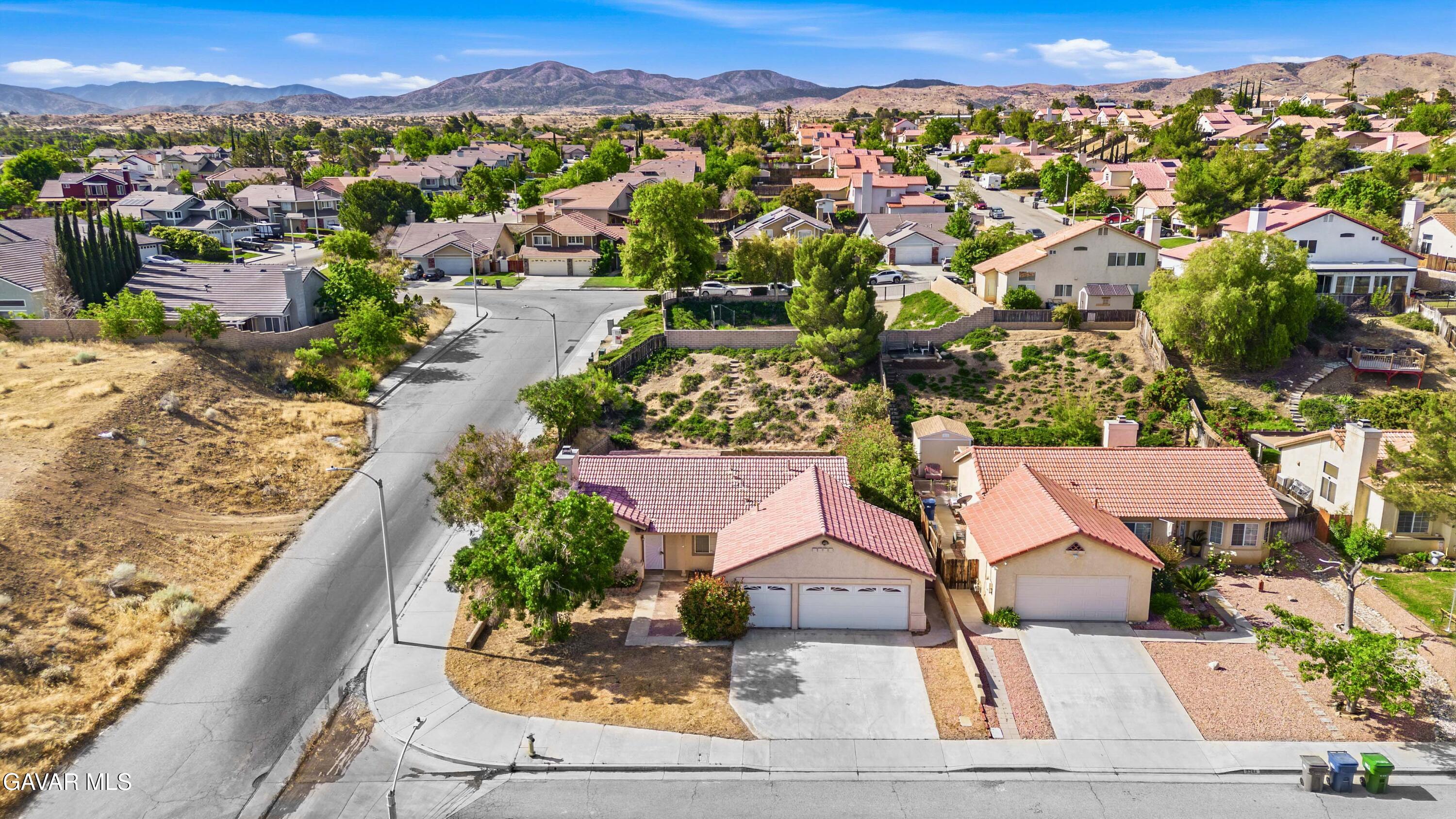 3254 Quarry Road Palmdale, CA 93550 - Photo 30 of 30 an aerial view of residential houses with outdoor space