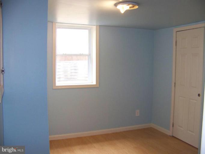 11520 Idlewood Road Silver Spring, MD 20906 - Photo 14 of 18 Sweet suite bedroom with lots of light.