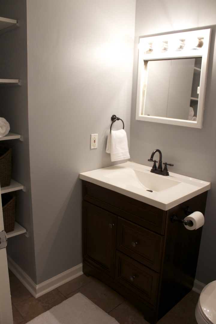 57 Springdale Road Montgomery, IL 60538 - Photo 13 of 19 a bathroom with a sink and a mirror