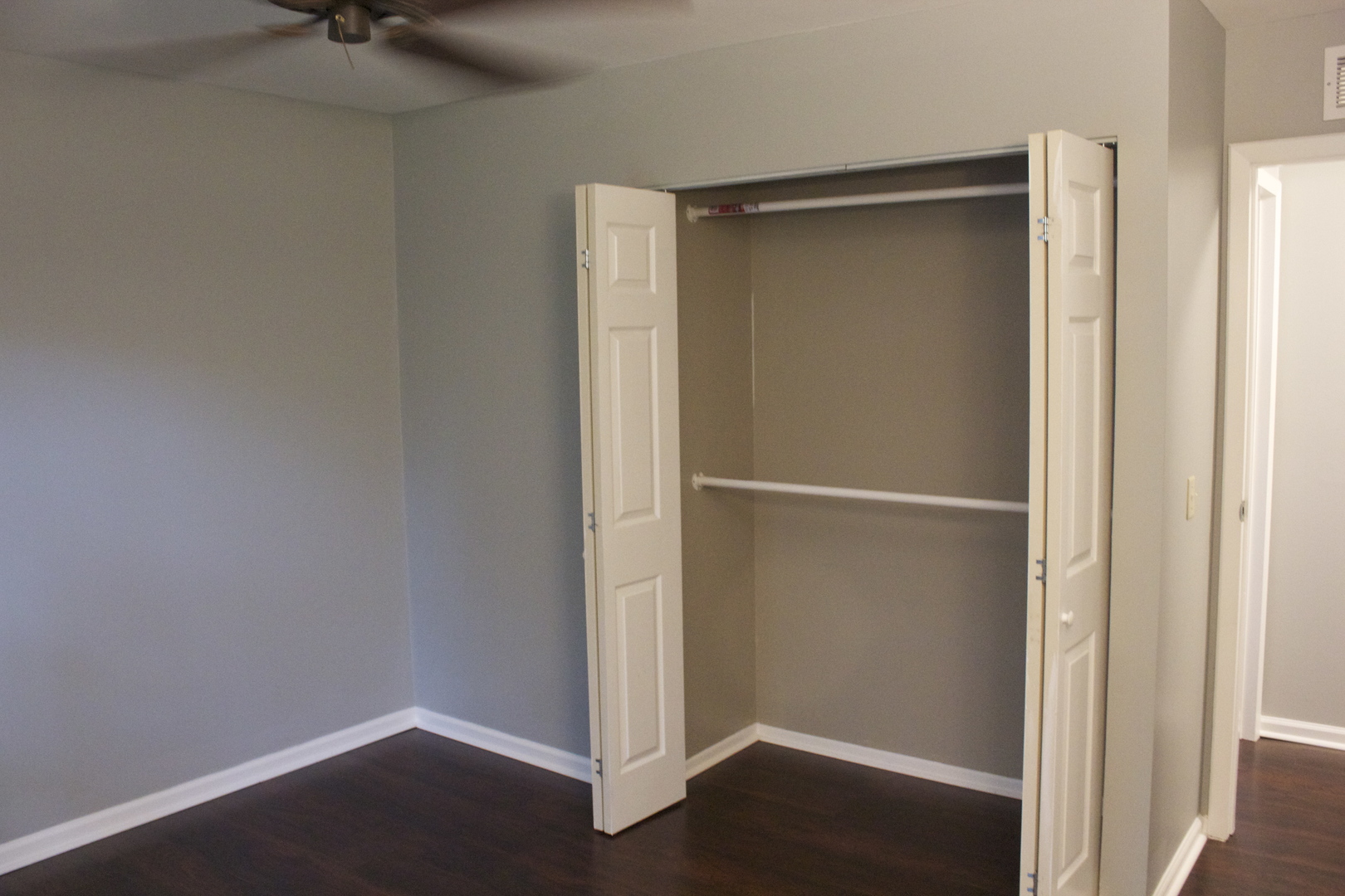 57 Springdale Road Montgomery, IL 60538 - Photo 18 of 19 a view of closet area with wooden floor