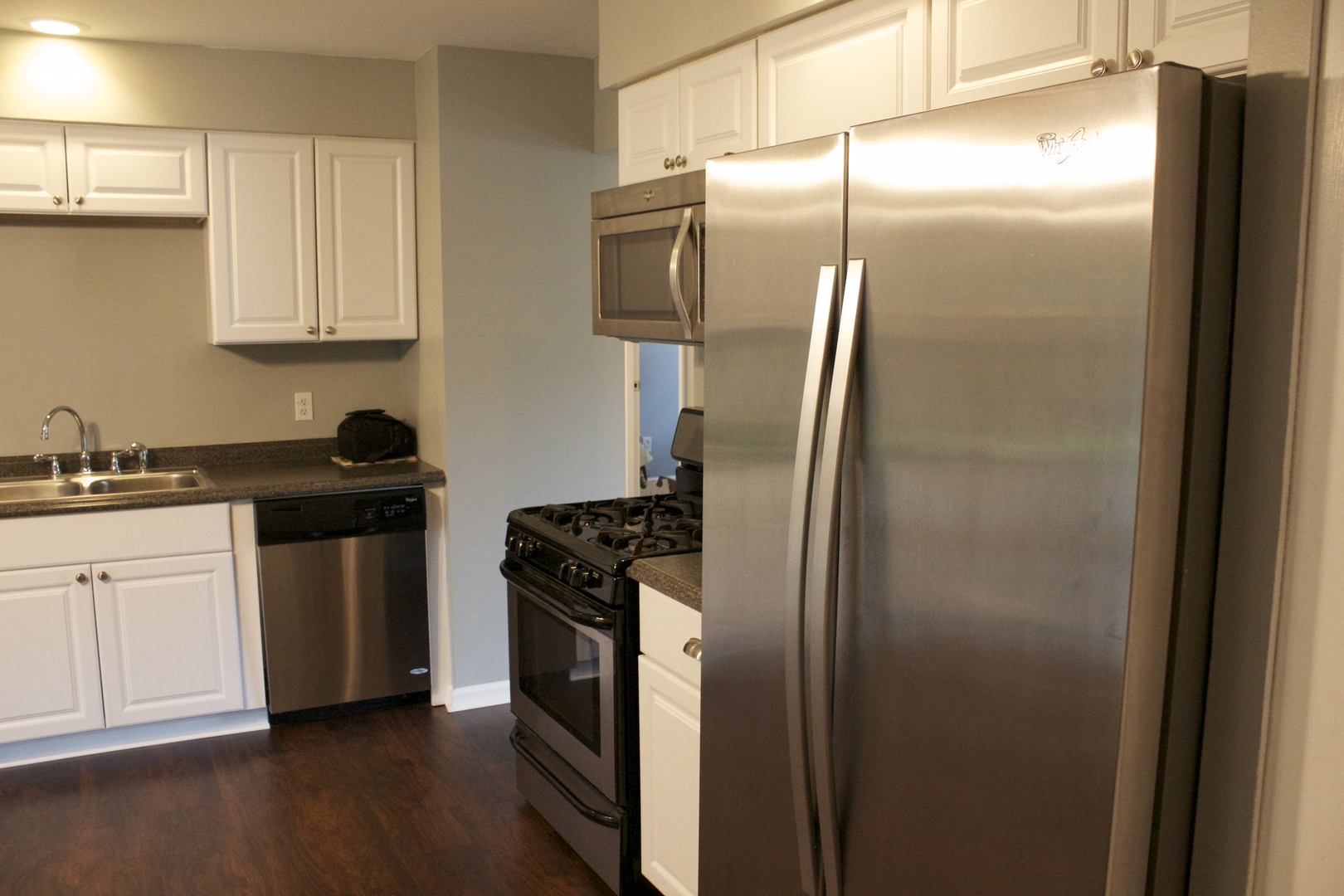57 Springdale Road Montgomery, IL 60538 - Photo 8 of 19 a kitchen with stainless steel appliances granite countertop a refrigerator and a sink