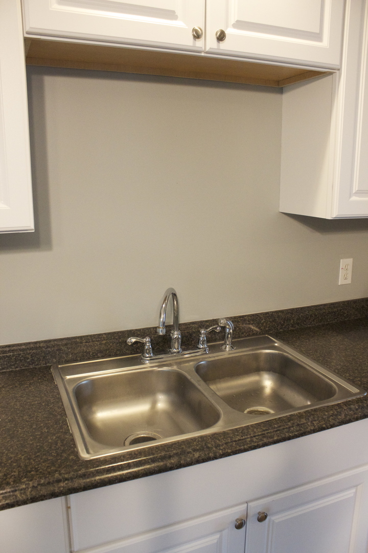 57 Springdale Road Montgomery, IL 60538 - Photo 9 of 19 a close view of sink and tap