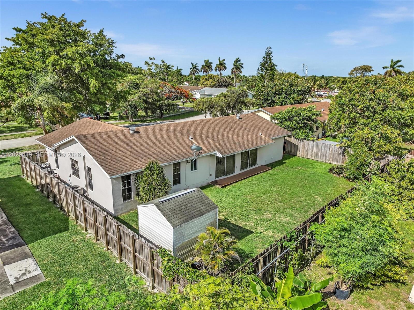 11061 Southwest 163rd Street Miami, FL 33157 - Photo 32 of 42 an aerial view of a house