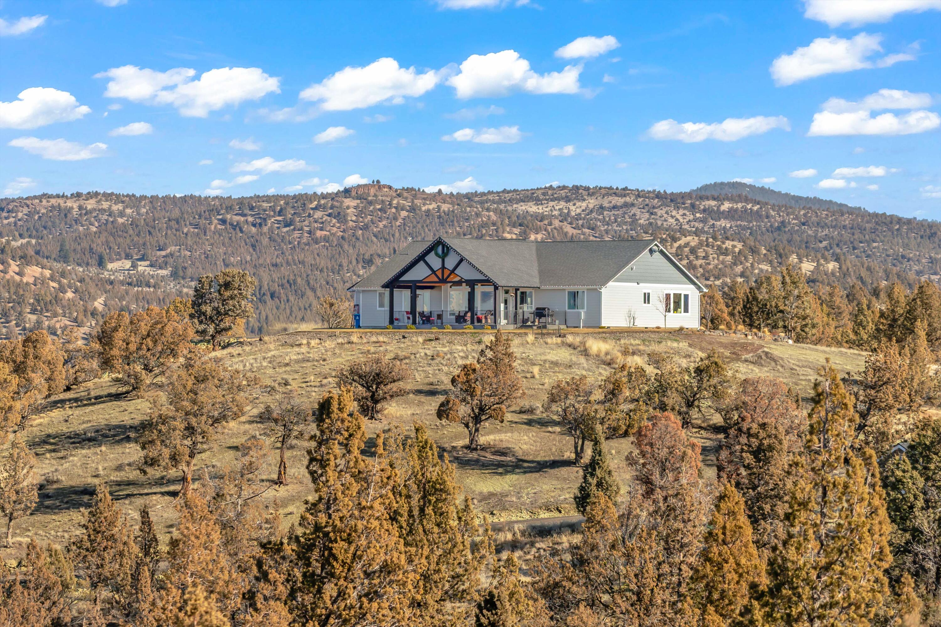 5582 North Mckay Road Prineville, OR 97754 - Photo 51 of 54 a view of houses with sky view