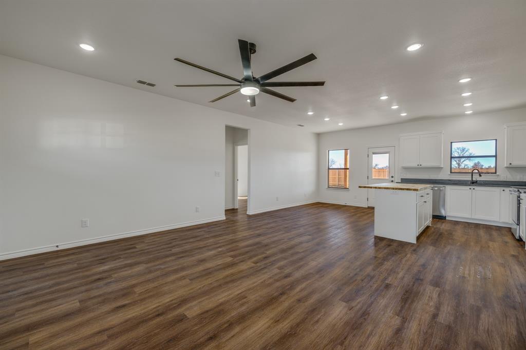 900 Ruger Drive Clyde, TX 79510 - Photo 3 of 11 a view of a kitchen with a sink and a window