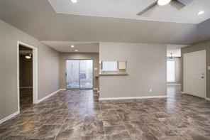 16907 Amidon Drive Spring, TX 77379 - Photo 6 of 13 a view of a kitchen with refrigerator and window
