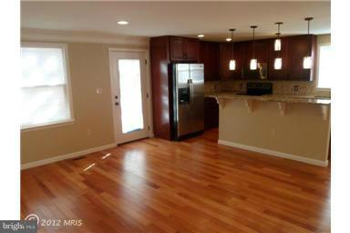 452 Riverside Drive Pasadena, MD 21122 - Photo 5 of 23 Kitchen opens to Family Room