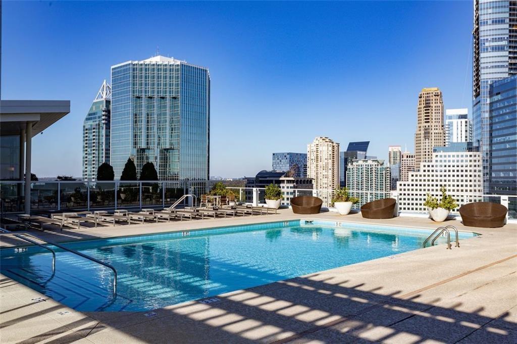 3325 Piedmont Road Northeast, Unit 1509 Atlanta, GA 30305 - Photo 21 of 29 a view of swimming pool with outdoor seating