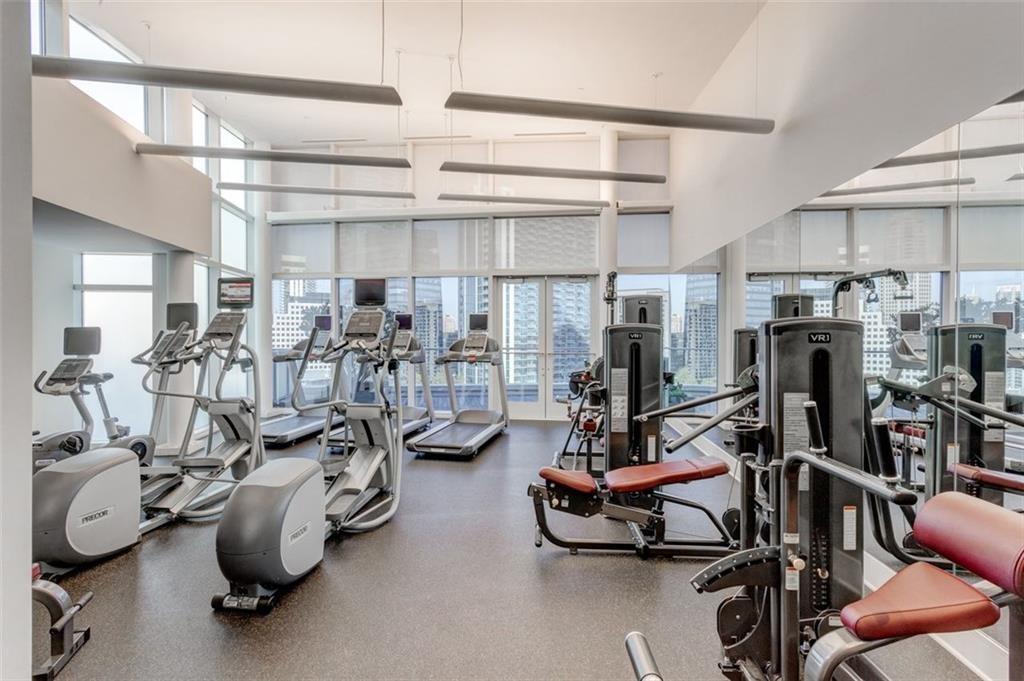 3325 Piedmont Road Northeast, Unit 1509 Atlanta, GA 30305 - Photo 28 of 29 a view of a room with gym equipment