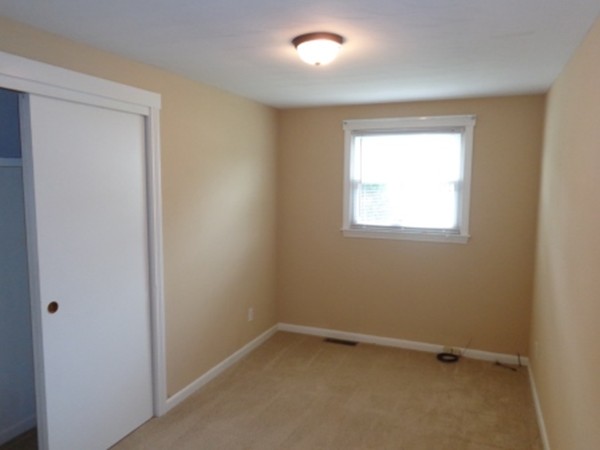 197 Mallowhill Road Springfield, MA 01129 - Photo 5 of 17 an empty room with a window