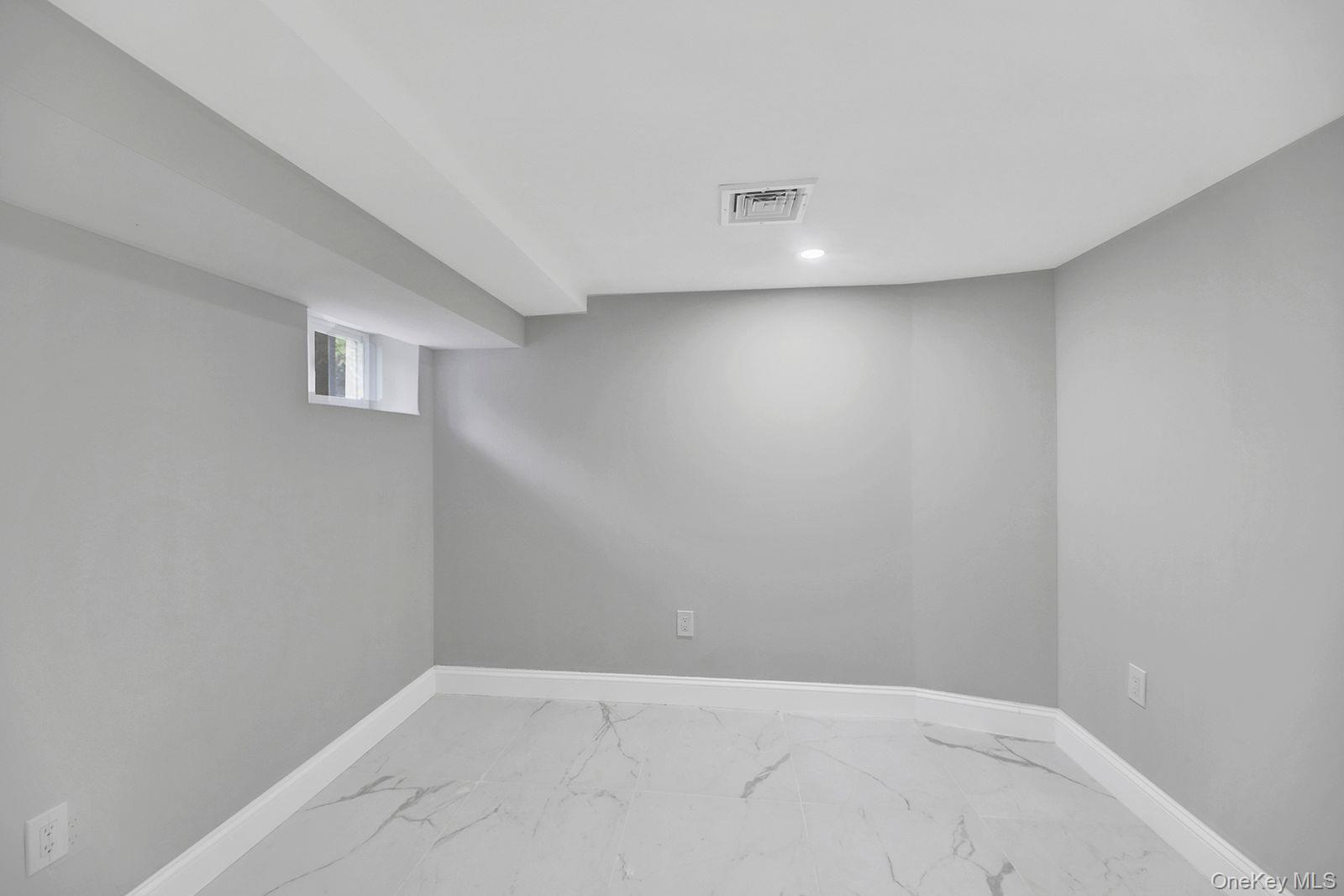 217-14 133rd Road Queens, NY 11413 - Photo 27 of 32 a view of an empty room