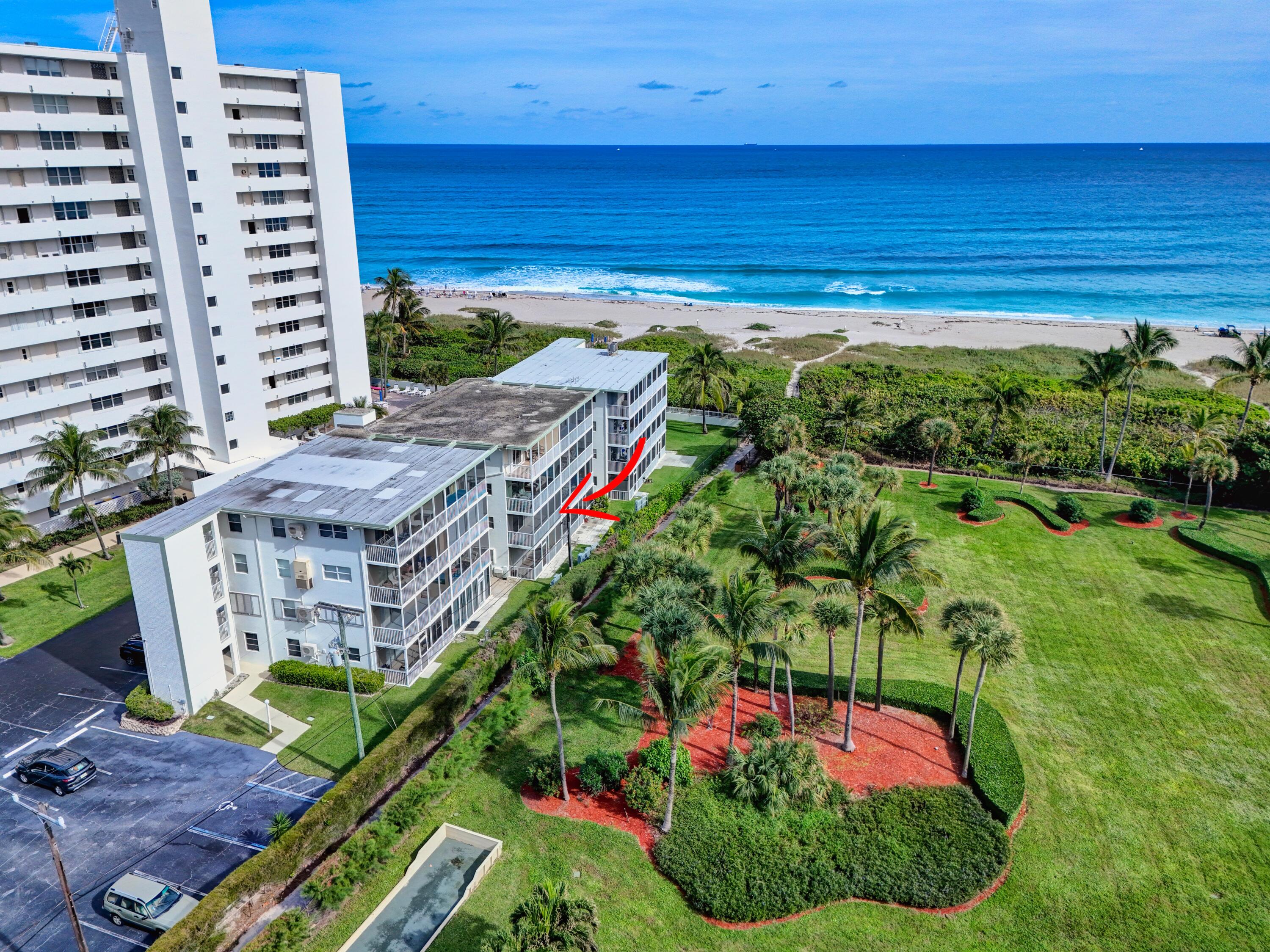 3600 North Ocean Drive, Unit 223 Singer Island, FL 33404 - Photo 16 of 47 a view of a balcony with a yard