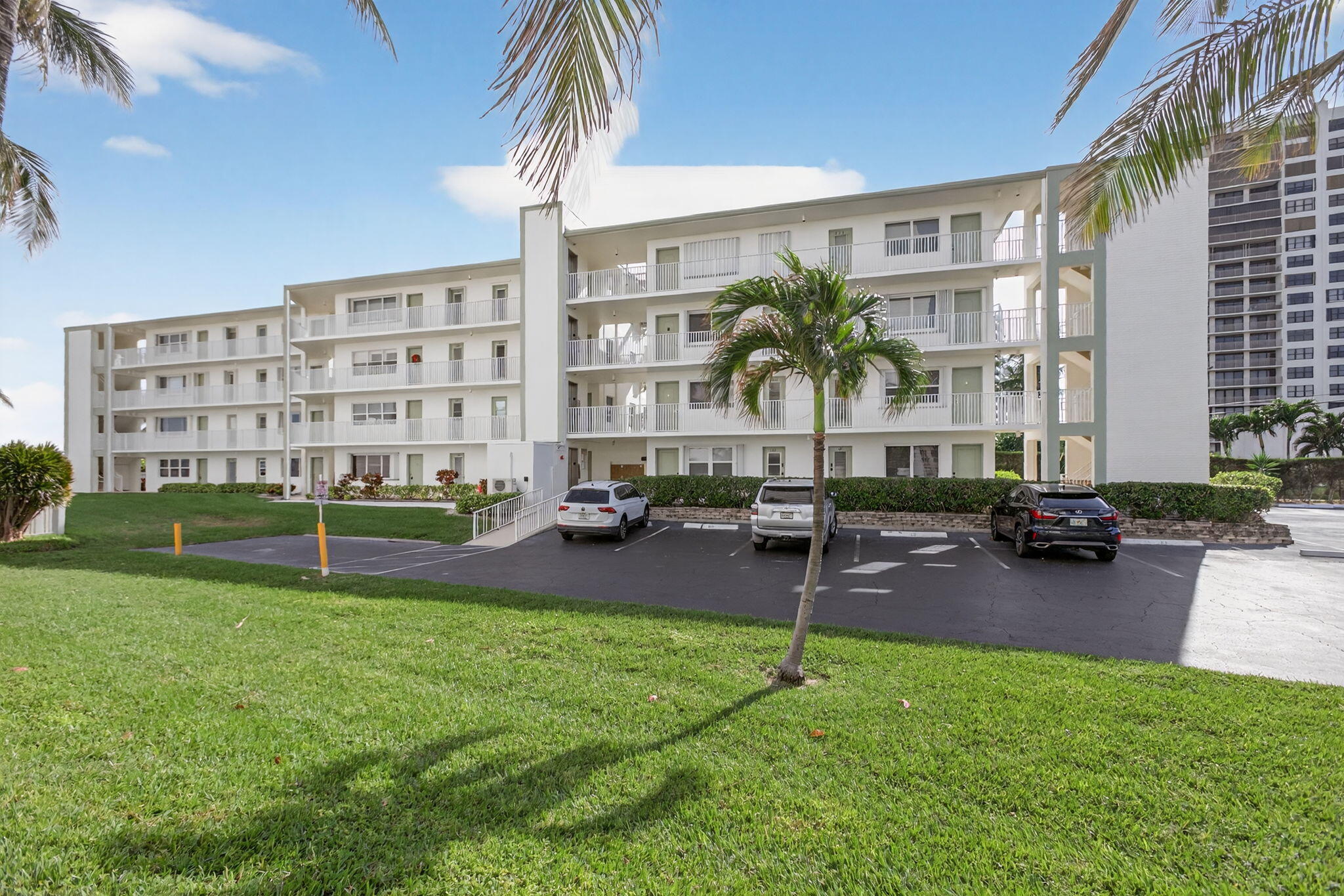 3600 North Ocean Drive, Unit 223 Singer Island, FL 33404 - Photo 32 of 47 a view of a patio with a table and chairs