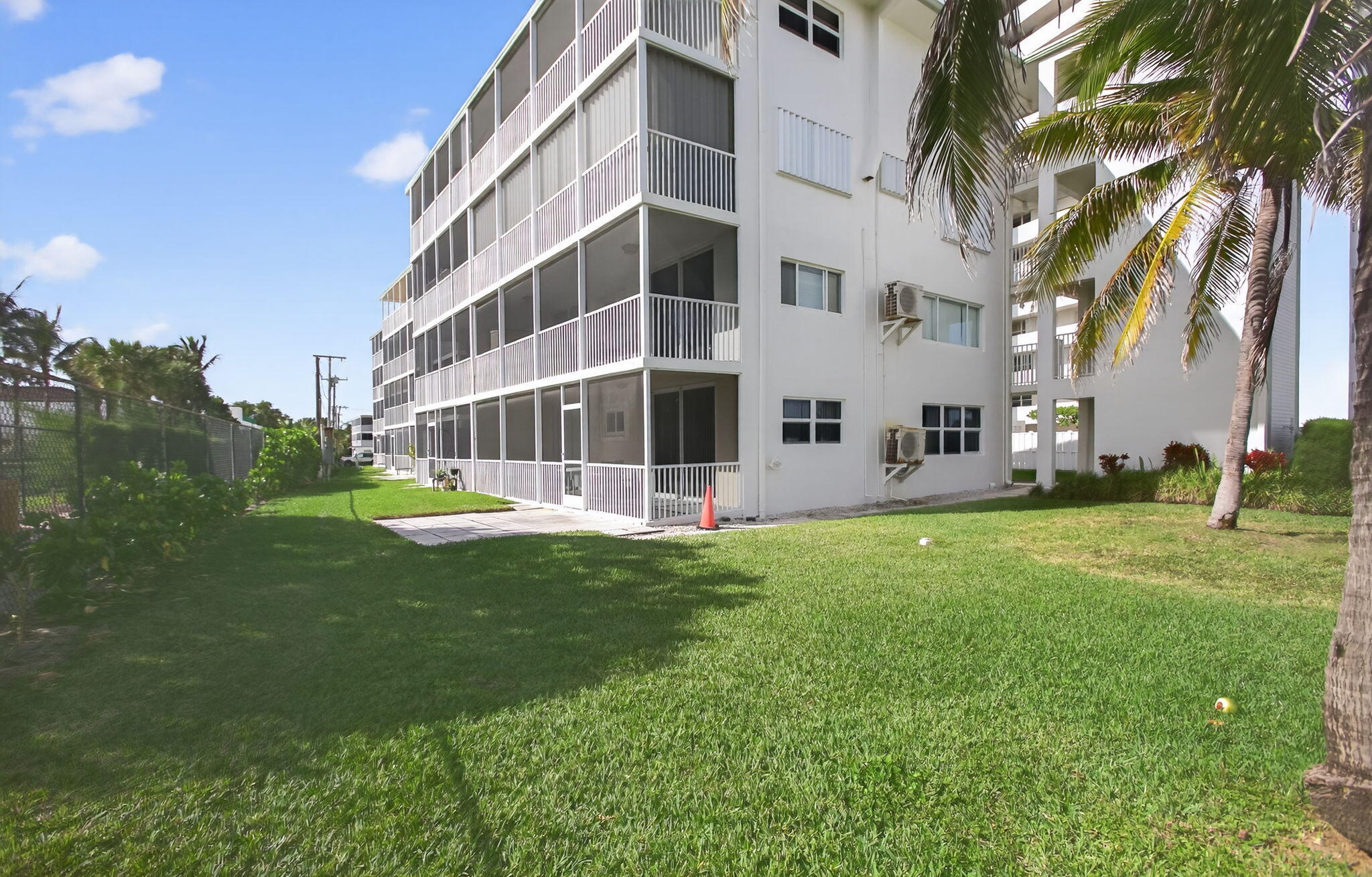 3600 North Ocean Drive, Unit 223 Singer Island, FL 33404 - Photo 38 of 47 a view of a building with a yard