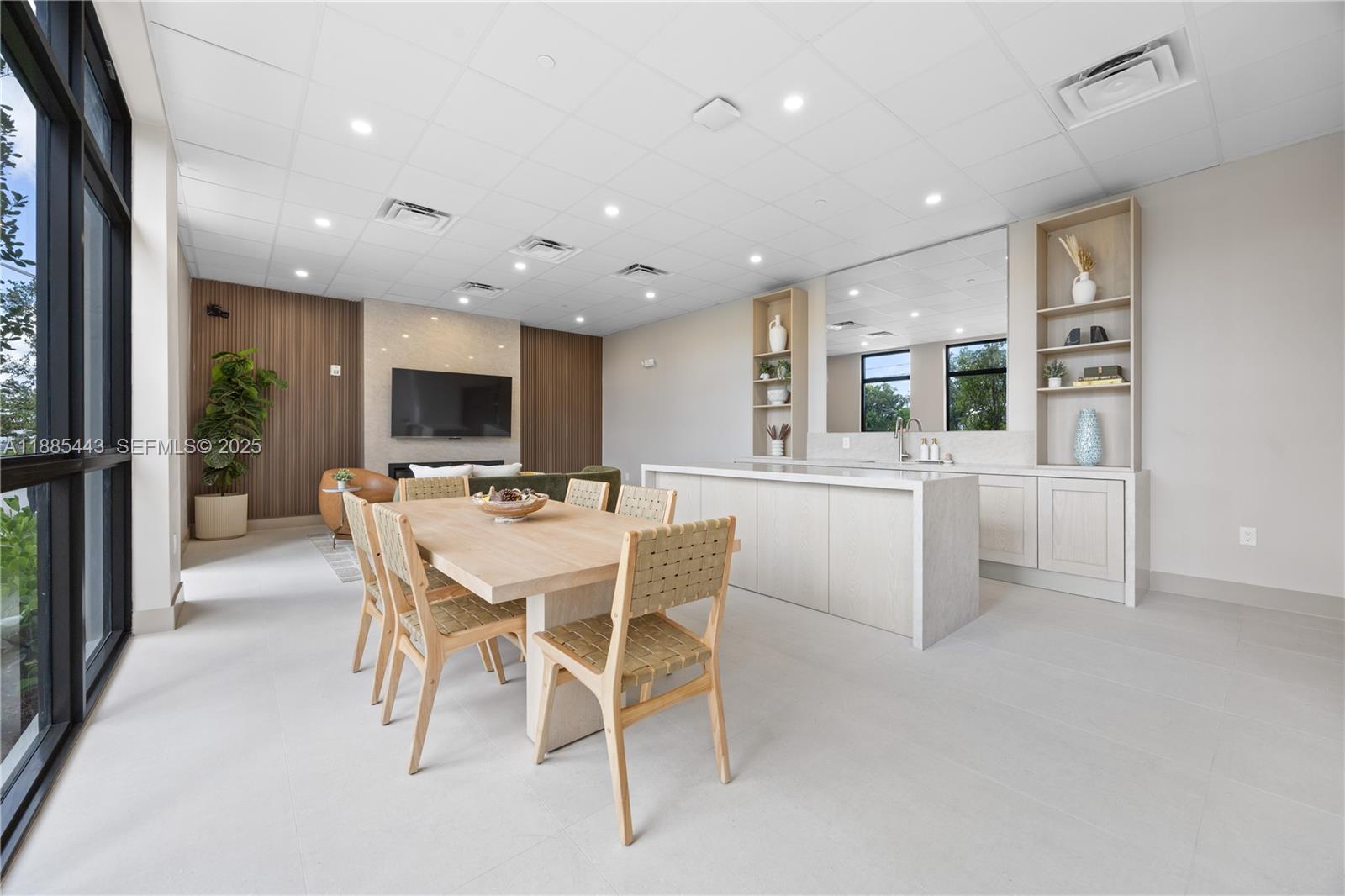 21850 Old Dixie Highway, Unit 1 Miami, FL 33170 - Photo 3 of 13 a dining room with a table and chairs