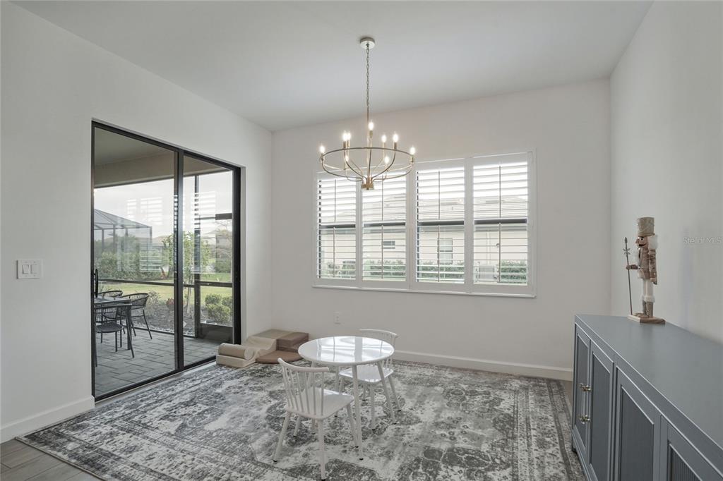 15906 Tradewind Terrace Lakewood Ranch, FL 34211 - Photo 13 of 67 a room with window and outdoor view