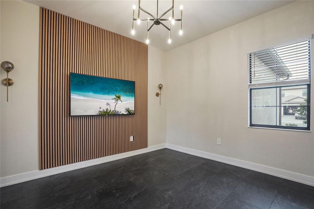 15906 Tradewind Terrace Lakewood Ranch, FL 34211 - Photo 14 of 67 an empty room with windows and fan