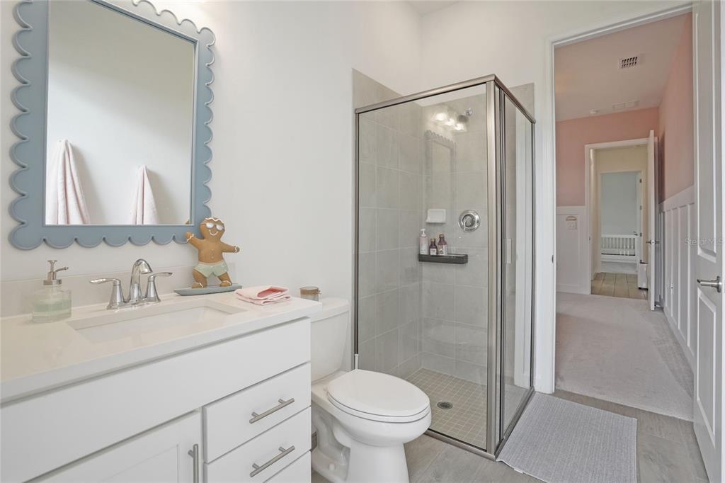 15906 Tradewind Terrace Lakewood Ranch, FL 34211 - Photo 28 of 67 a bathroom with a sink toilet and shower
