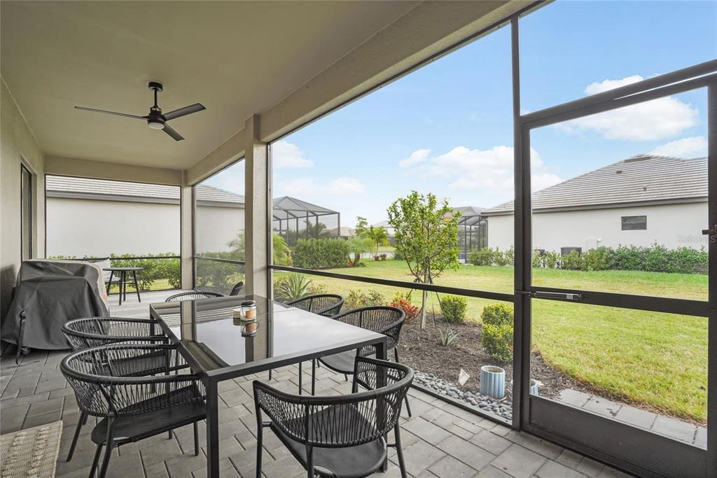 15906 Tradewind Terrace Lakewood Ranch, FL 34211 - Photo 30 of 67 a view of a dining room with furniture window and outside view